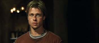 Movie still from “The Mexican” (2001), directed by Gore Verbinski – A person wearing a red shirt; Close Up shot, Low angle