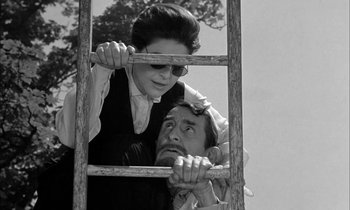 Movie still from “The Miracle Worker” (1962), directed by Arthur Penn – An older man and a younger woman climbing a ladder; Medium shot, Low angle