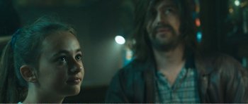 Movie still from “The Misfortunates” (2009), directed by Felix van Groeningen – A man and a woman are looking at each other; Close Up shot, Over the shoulder angle