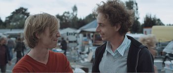 Movie still from “The Misfortunates” (2009), directed by Felix van Groeningen – A man and a woman talking to each other outside; Close Up shot, Over the shoulder angle