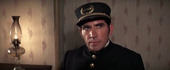 Movie still from “The Molly Maguires” (1970), directed by Martin Ritt – A person wearing a uniform; Close Up shot, Low angle