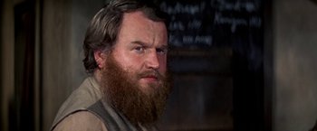 Movie still from “The Molly Maguires” (1970), directed by Martin Ritt – A person with a beard; Close Up shot, Low angle