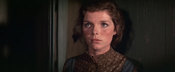 Movie still from “The Molly Maguires” (1970), directed by Martin Ritt – A young woman with brown hair wearing a polka dot shirt; Close Up shot, Low angle