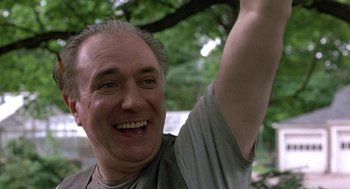 Movie still from “The Money Pit” (1986), directed by Richard Benjamin – A person raising his arm; Close Up shot, Low angle