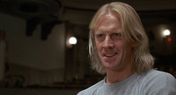 Movie still from “The Money Pit” (1986), directed by Richard Benjamin – A person with long blonde hair; Close Up shot, Low angle