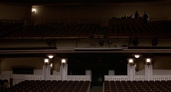 Movie still from “The Money Pit” (1986), directed by Richard Benjamin – A view of an auditorium from the stage; Extreme Wide shot, High angle