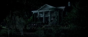 Movie still from “The Monster Squad” (1987), directed by Fred Dekker – An old abandoned house in the middle of the night; Extreme Wide shot, Low angle