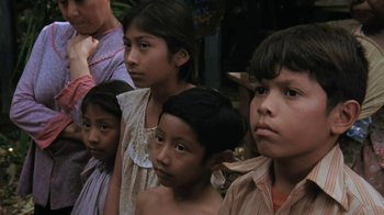 Movie still from “The Mosquito Coast” (1986), directed by Peter Weir – A group of young people standing next to each other; Close Up shot, High angle