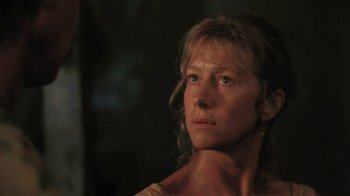 Movie still from “The Mosquito Coast” (1986), directed by Peter Weir – A person wearing a dress; Close Up shot, Low angle