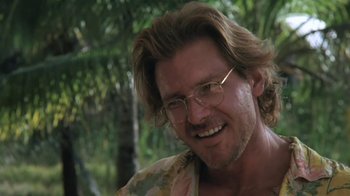 Movie still from “The Mosquito Coast” (1986), directed by Peter Weir – A person wearing glasses; Close Up shot, Low angle