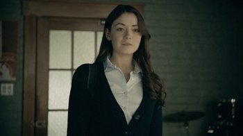 Movie still from “The Moth Diaries” (2011), directed by Mary Harron – A woman in a white shirt and a black jacket; Close Up shot, Over the shoulder angle