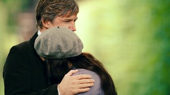 Movie still from “The Moth Diaries” (2011), directed by Mary Harron – A man and a woman embracing each other; Close Up shot, Over the shoulder angle