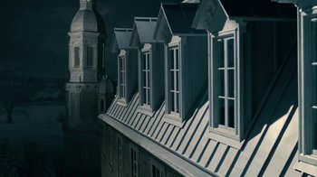 Movie still from “The Moth Diaries” (2011), directed by Mary Harron – A building that has many windows on the top of it; Extreme Wide shot, Low angle