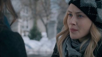 Movie still from “The Moth Diaries” (2011), directed by Mary Harron – A person wearing a hat and scarf; Close Up shot, Over the shoulder angle