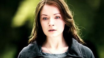 Movie still from “The Moth Diaries” (2011), directed by Mary Harron – A person with long brown hair; Close Up shot, High angle