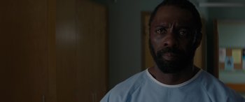 Movie still from “The Mountain Between Us” (2017), directed by Hany Abu-Assad – A person wearing a blue shirt; Close Up shot, Over the shoulder angle