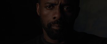 Movie still from “The Mountain Between Us” (2017), directed by Hany Abu-Assad – A person's face in the dark; Close Up shot, Overhead angle