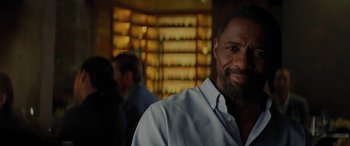 Movie still from “The Mountain Between Us” (2017), directed by Hany Abu-Assad – A person wearing a white shirt; Close Up shot, Over the shoulder angle