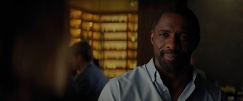 Movie still from “The Mountain Between Us” (2017), directed by Hany Abu-Assad – A person wearing a shirt; Close Up shot, Over the shoulder angle