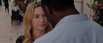 Movie still from “The Mountain Between Us” (2017), directed by Hany Abu-Assad – A woman looking at a man in front of a mirror; Close Up shot, Over the shoulder angle