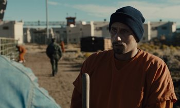 Movie still from “The Mustang” (2019), directed by Laure de Clermont-Tonnerre – A man with a baseball bat in his hands; Close Up shot, Over the shoulder angle