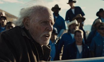 Movie still from “The Mustang” (2019), directed by Laure de Clermont-Tonnerre – An old man with a beard is looking into the distance; Close Up shot, Low angle