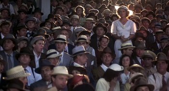 Movie still from “The Natural” (1984), directed by Barry Levinson – A large group of men and women wearing hats; Wide shot, High angle