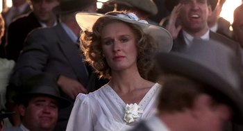 Movie still from “The Natural” (1984), directed by Barry Levinson – A person wearing a hat; Close Up shot, Over the shoulder angle