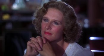 Movie still from “The Natural” (1984), directed by Barry Levinson – A person with her hands clasped together; Close Up shot, High angle