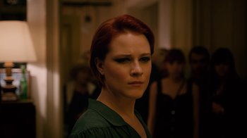 Movie still from “Charlie Countryman” (2013), directed by Fredrik Bond – A person with red hair; Close Up shot, Over the shoulder angle