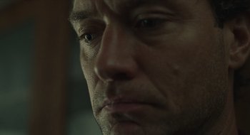 Movie still from “The Nest” (2020), directed by Sean Durkin – A man's face as he stares off into the distance; Extreme Close Up shot, Low angle
