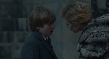 Movie still from “The Nest” (2020), directed by Sean Durkin – A young boy and a young woman talking to each other; Close Up shot, Over the shoulder angle