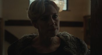 Movie still from “The Nest” (2020), directed by Sean Durkin – A person wearing a fur coat; Close Up shot, Over the shoulder angle