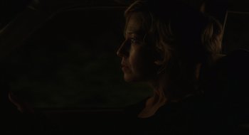 Movie still from “The Nest” (2020), directed by Sean Durkin – A woman looking out of a car window at night; Close Up shot, Over the shoulder angle