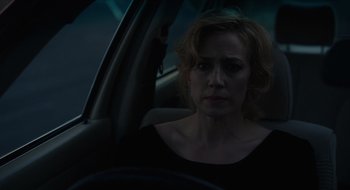 Movie still from “The Nest” (2020), directed by Sean Durkin – A woman sitting in the driver's seat of a car at night; Close Up shot, Over the shoulder angle