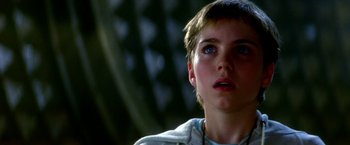 Movie still from “The NeverEnding Story II: The Next Chapter” (1990), directed by George Miller – A person looking up at the sky; Close Up shot, Low angle