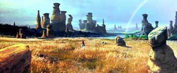 Movie still from “The NeverEnding Story II: The Next Chapter” (1990), directed by George Miller – A person standing in the middle of an open field; Extreme Wide shot, High angle