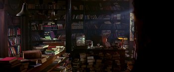Movie still from “The NeverEnding Story II: The Next Chapter” (1990), directed by George Miller – A room filled with lots and lots of books; Wide shot, High angle