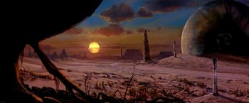 Movie still from “The NeverEnding Story II: The Next Chapter” (1990), directed by George Miller – An oil painting of a sunset in a desert; Extreme Wide shot, Low angle