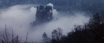 Movie still from “The Ninth Configuration” (1980), directed by William Peter Blatty – A castle in the middle of the fog; Extreme Wide shot, Low angle