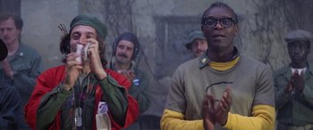 Movie still from “The Ninth Configuration” (1980), directed by William Peter Blatty – A group of people standing next to each other; Close Up shot, Over the shoulder angle