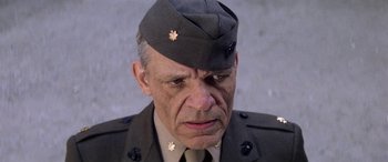 Movie still from “The Ninth Configuration” (1980), directed by William Peter Blatty – An older man in a military uniform looking sad; Close Up shot, Low angle