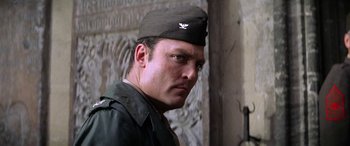 Movie still from “The Ninth Configuration” (1980), directed by William Peter Blatty – A man in a military uniform with a hat on; Close Up shot, Low angle