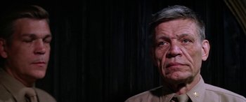 Movie still from “The Ninth Configuration” (1980), directed by William Peter Blatty – An older man is looking into the distance; Close Up shot, Low angle