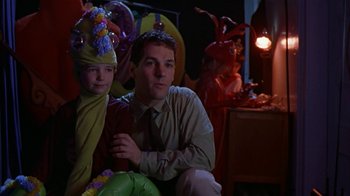 Movie still from “The Object of My Affection” (1998), directed by Nicholas Hytner – A man and a little girl dressed up for halloween; Medium shot, Low angle