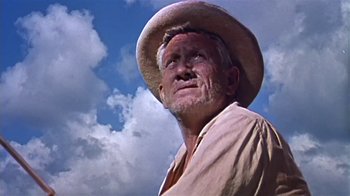 Movie still from “The Old Man and the Sea” (1958), directed by Fred Zinnemann – An old man wearing a straw hat looking up at the sky; Close Up shot, Low angle