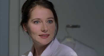 Movie still from “The One and Only” (1999), directed by Susanne Bier – A person wearing a white shirt; Close Up shot, Over the shoulder angle