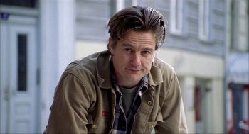 Movie still from “The One and Only” (1999), directed by Susanne Bier – A person wearing a shirt and a jacket; Close Up shot, Low angle