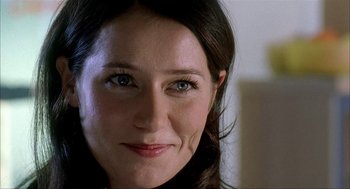 Movie still from “The One and Only” (1999), directed by Susanne Bier – A woman's face with blue eyes; Close Up shot, Over the shoulder angle