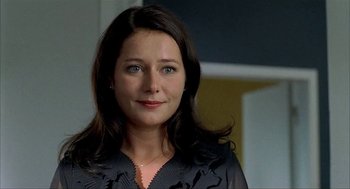 Movie still from “The One and Only” (1999), directed by Susanne Bier – A person with long hair; Close Up shot, Over the shoulder angle